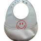 Siliconen slabber met opvangbakje – Beige – Smiley Rood
